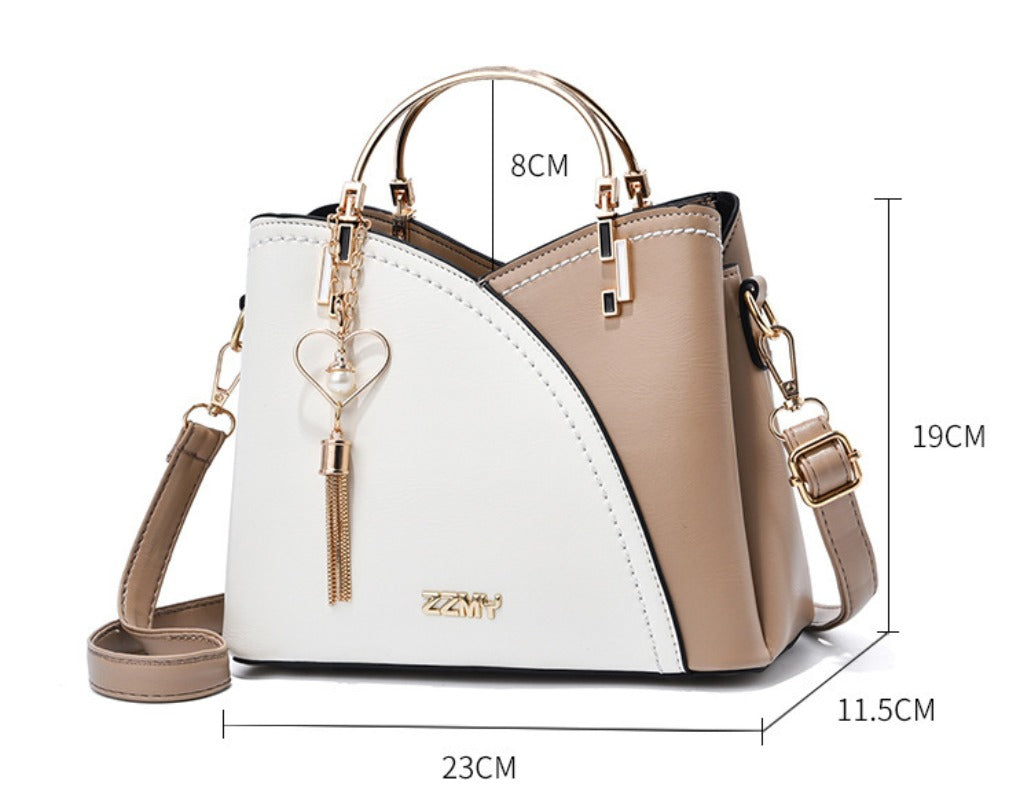 The Victoria Signature Handbag
